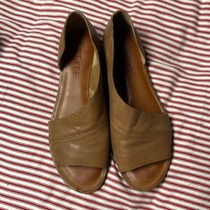 1. State sandal flats